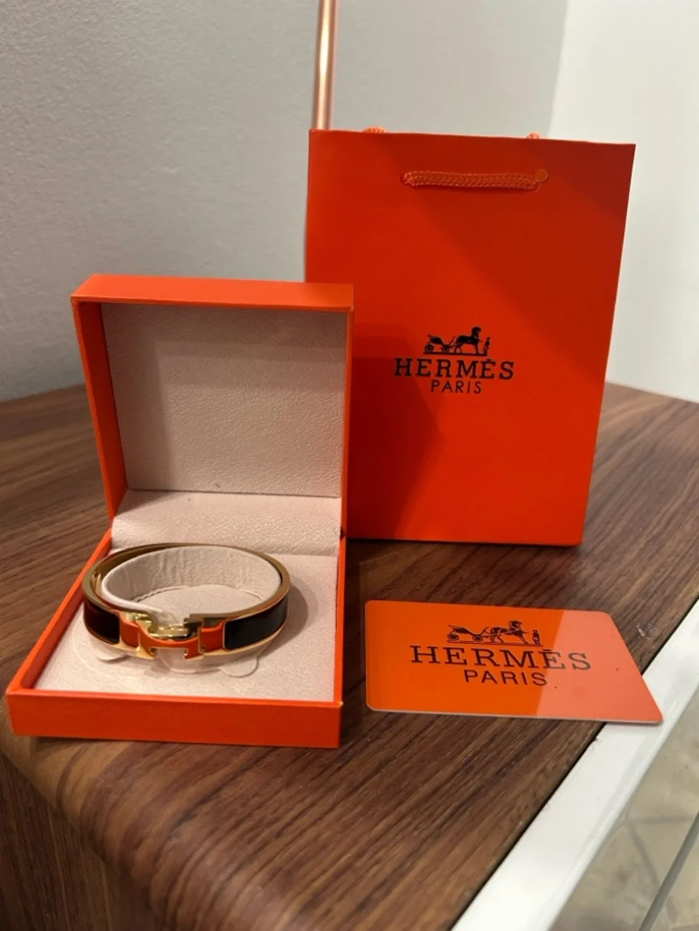 Hermes Black And Gold Clic H Bracelet - Picture 1 of 4